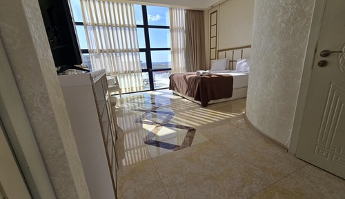 Habitación estándar con 2 camas individuales, 1 cama de matrimonio, vistas a la playa