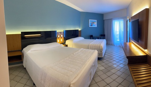 Habitación cuádruple Deluxe, vistas a la piscina