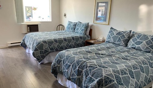 Habitación cuádruple Deluxe, 2 camas dobles