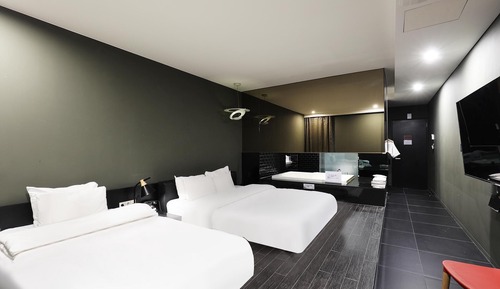 Habitación básica con 2 camas individuales