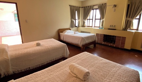 Habitación triple básica, vistas al jardín