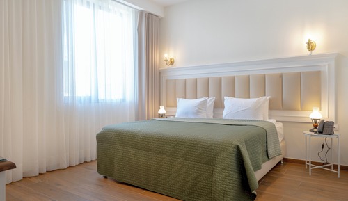 Habitación superior con 1 cama doble o 2 individuales