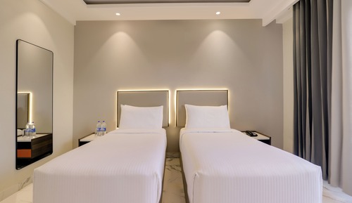 Habitación ejecutiva con 2 camas individuales, balcón