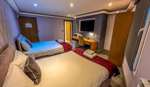 Habitación cuádruple ejecutiva