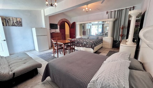Habitación Deluxe, varias camas, fumadores, vistas al jardín