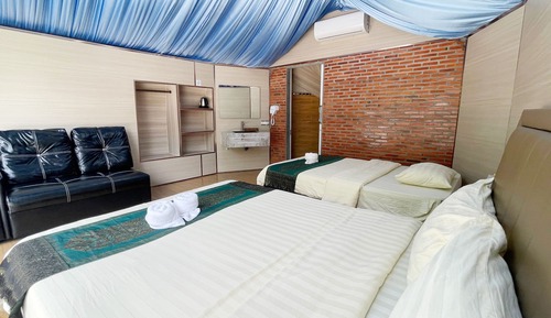 Habitación triple Deluxe