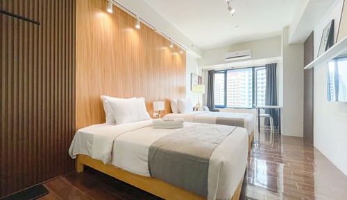 Apartamento Business, varias camas, frigorífico y microondas, vistas a la ciudad