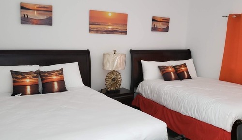 Habitación Deluxe doble, vistas parciales al mar, junto a la piscina