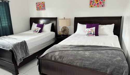 Habitación Deluxe doble, vistas parciales al mar, junto a la piscina