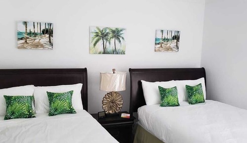 Habitación Deluxe doble, vistas parciales al mar, junto a la piscina