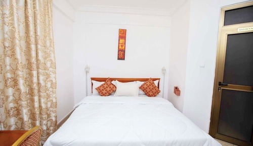 Habitación estándar con 1 cama doble o 2 individuales