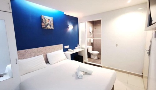Habitación Deluxe con 2 camas individuales, 1 cama de matrimonio