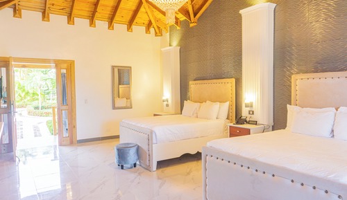 Habitación Deluxe, 2 camas de matrimonio, vistas al jardín