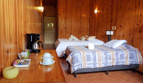 Habitación triple, vistas al jardín