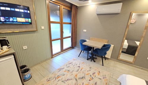 Habitación Confort, cocina, vistas a la ciudad