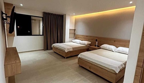 Habitación de lujo con 2 camas individuales, vistas a la ciudad