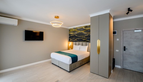 Habitación Deluxe doble, 1 cama de matrimonio con sofá cama