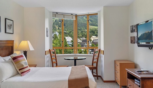 Estudio Confort, 1 cama de matrimonio, cocina básica, vistas a la montaña