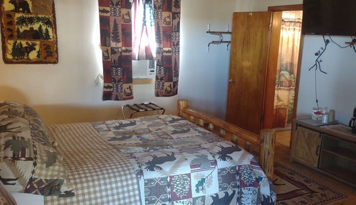 Suite estudio Deluxe, 1 cama de matrimonio, cocina básica, planta baja