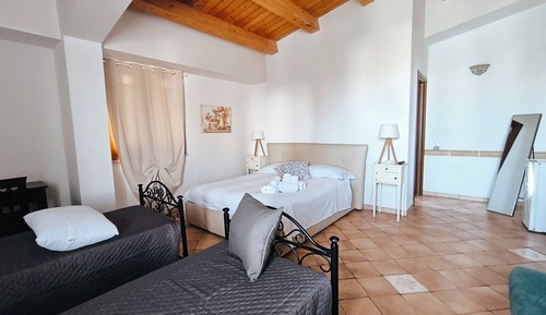 Habitación cuádruple familiar, vistas al jardín