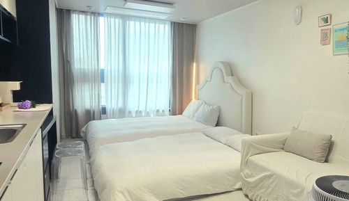 Habitación Signature con 1 cama doble o 2 individuales, 1 habitación, vistas a la ciudad
