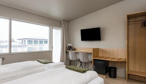 Habitación superior con 1 cama doble o 2 individuales, balcón