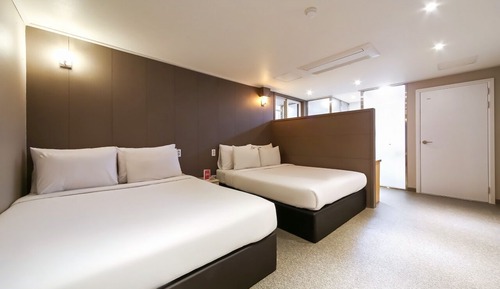 Habitación familiar con 2 camas individuales
