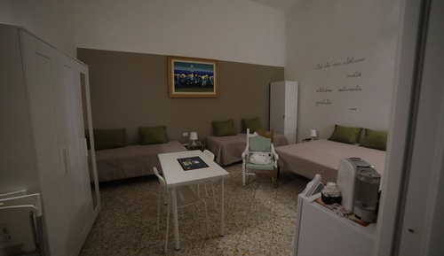 Habitación cuádruple familiar, vistas al patio