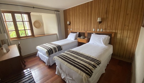 Habitación estándar con 1 cama doble o 2 individuales, vistas al jardín
