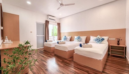 Habitación triple Deluxe