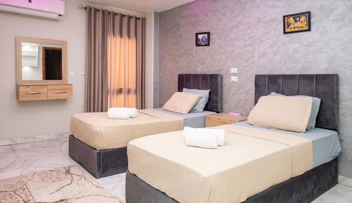 Habitación Signature con 1 cama doble o 2 individuales
