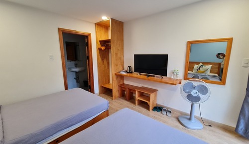 Habitación Business con 1 cama doble o 2 individuales