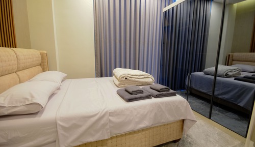 Apartamento Business, vistas al jardín