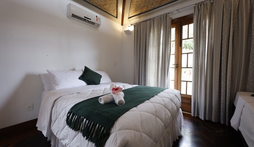 Habitación triple Confort, vistas al jardín