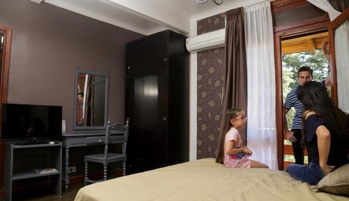Habitación triple familiar, varias camas