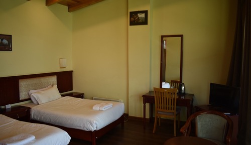 Habitación estándar con 1 cama doble o 2 individuales