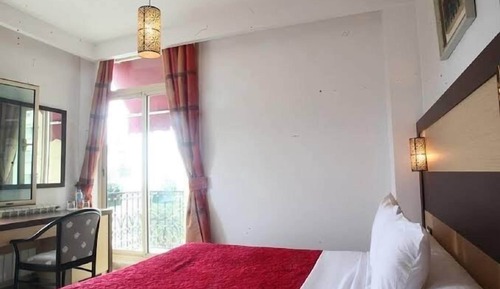 Habitación estándar con 1 cama doble o 2 individuales