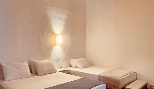 Habitación cuádruple Deluxe, vistas al jardín
