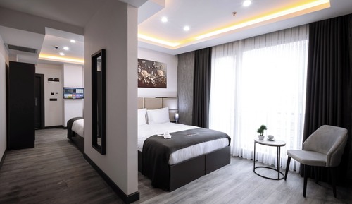 Habitación cuádruple Deluxe