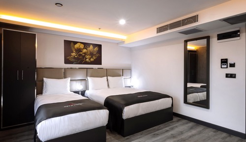 Habitación triple Deluxe