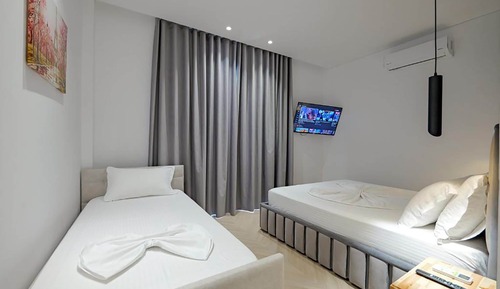 Habitación triple Deluxe, vistas al mar