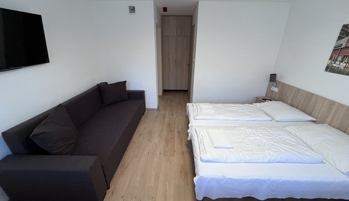 Habitación superior, varias camas