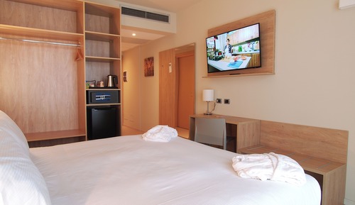 Habitación superior con 1 cama doble o 2 individuales