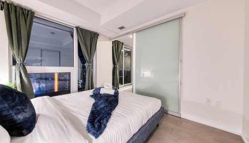 Suite Elite, varias camas, cocina, vistas a la ciudad