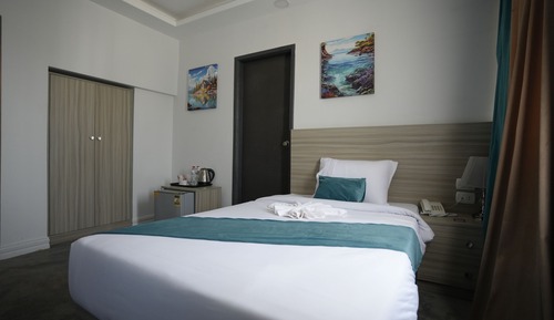 Habitación superior con 1 cama doble o 2 individuales