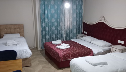 Habitación cuádruple Deluxe