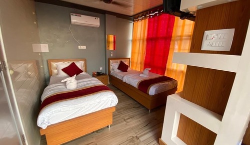 Habitación Deluxe con 1 cama doble o 2 individuales, vistas a la ciudad