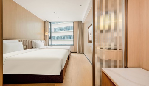 Habitación Business con 1 cama doble o 2 individuales