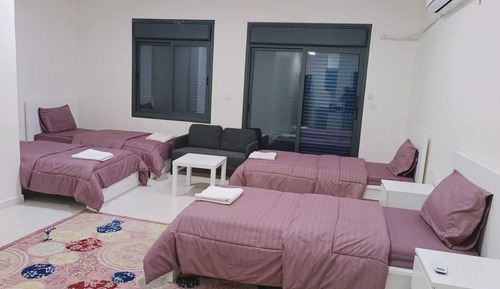 Habitación cuádruple Deluxe, varias camas