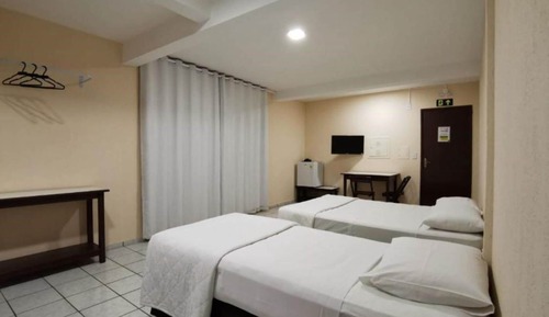 Habitación triple Deluxe, varias camas